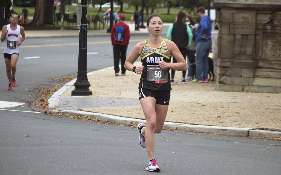 Lindsay Gabow, who came in second place, runs in front of the Capitol Building during the Marine Corps Marathon on Oct. 28, 2018.