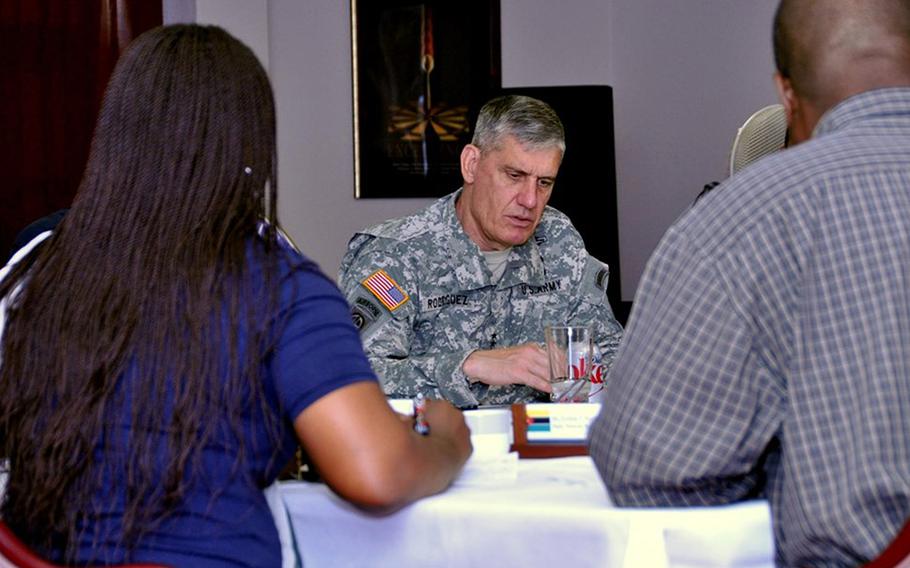 Gen. David M. Rodriguez, U.S. Africa Command commander, responds to questions from a delegation of media representatives from Angola and Mozambique during a briefing at the command headquarters in Stuttgart, Germany.