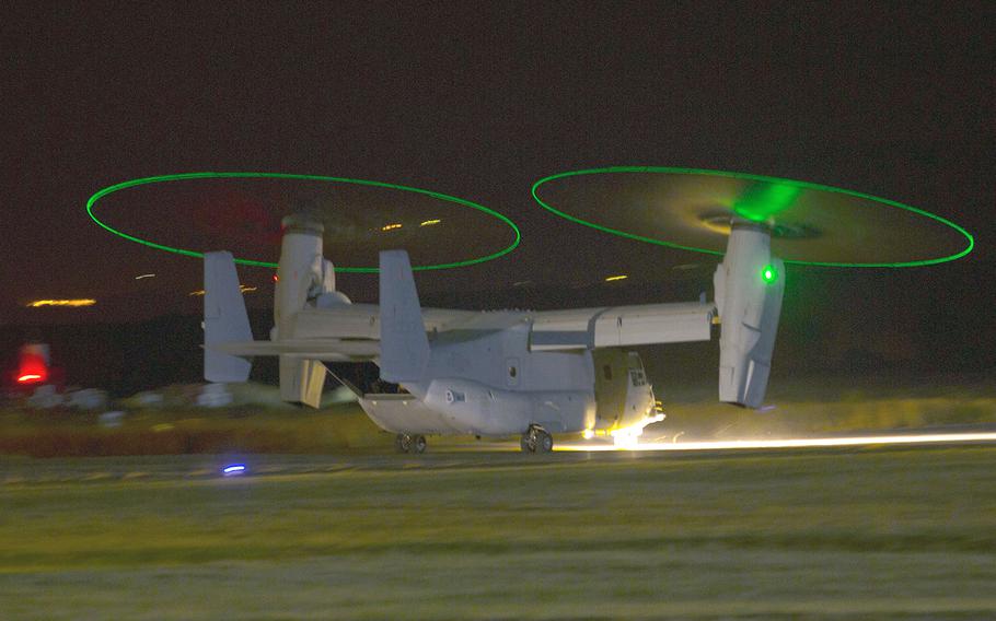 An MV-22B Osprey aircraft from Special-Purpose Marine Air-Ground Task Force Crisis Response prepares to leave Naval Air Station Sigonella, Italy, to escort approximately 150 personnel from the U.S. Embassy in Tripoli, Libya, on Saturday July 26, 2014.