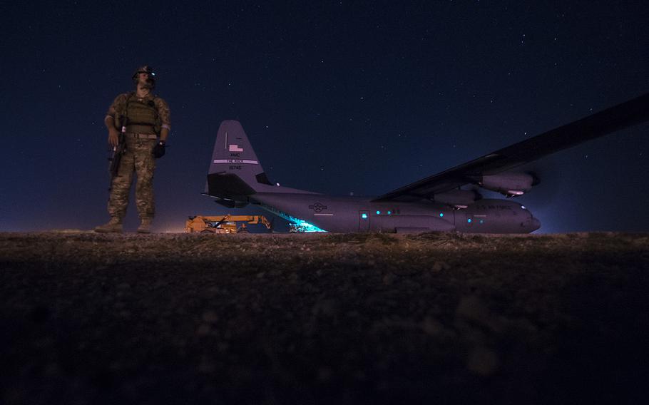 A fly-away security team from the 1st Battalion, 153rd Infantry Regiment provides security for a C-130J, May 26, 2017, during a cargo mission in Somalia, supporting the Combined Joint Task Force-Horn of Africa. 
