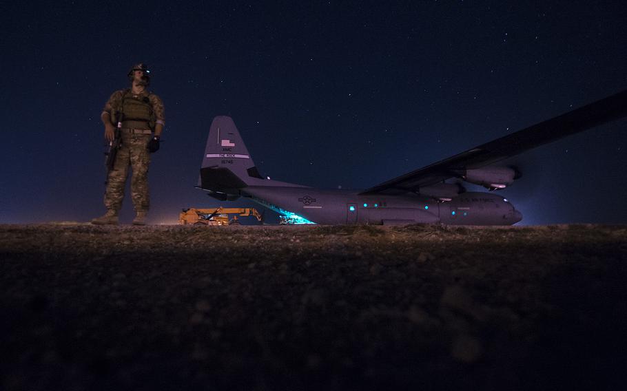 A fly-away security team from the 1st Battalion, 153rd Infantry Regiment provides security for a C-130J, May 26, 2017, during a cargo mission in Somalia, supporting the Combined Joint Task Force-Horn of Africa.