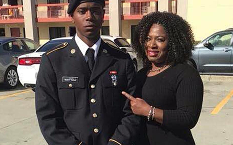 Spc. Henry Mayfield Jr., 23, seen here with his mother Carmoneta Horton-Mayfield, was among three Americans killed in an early morning attack Jan. 5, 2020, in Kenya after their military base was overrun by al-Shabab fighters.
