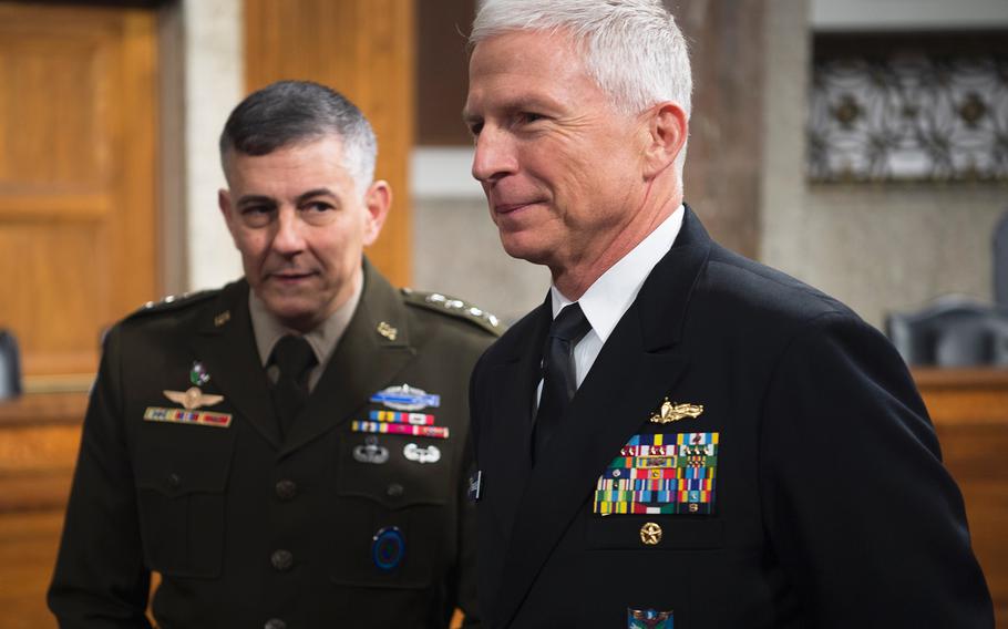 Adm. Craig Faller and Gen. Stephen Townsend, respectively commanders of Southern Command and Africa Command, prepare to testify before the Senate Armed Services Committee on Thursday, Jan. 30, 2020, on Capitol Hill in Washington.