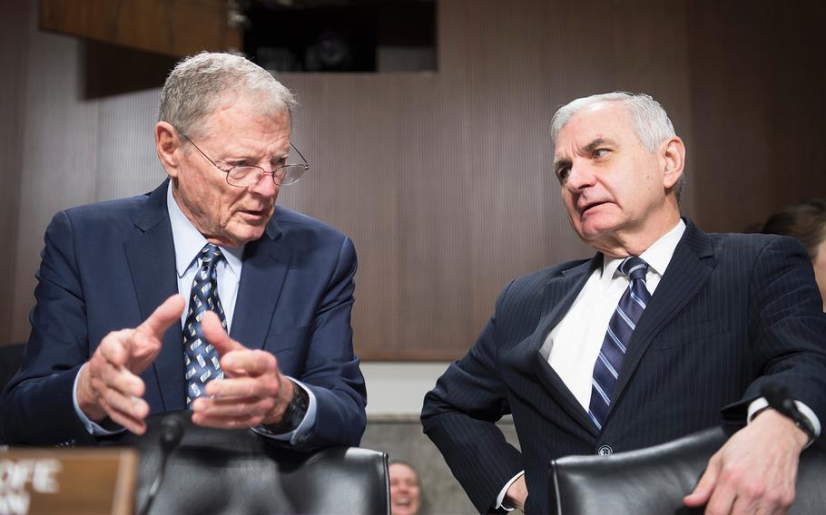 Sen. Jim Inhofe, R-Okla., left, and Sen. Jack Reed, D-R.I., chat prior to the start of a Senate Armed Services Committee hearing Thursday, Jan. 30, 2020, on Capitol Hill in Washington.