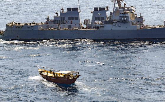 Service members from the destroyer USS Winston S. Churchill board a stateless dhow off the coast of Somalia and interdict an illicit shipment of weapons and weapon components,  Feb. 12, 2021. 

