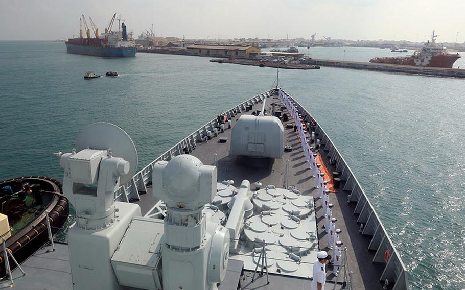 The Chinese destroyer Haikou sails into the port of Djibouti in 2017 for a visit. The base China has built in the African country is now capable of hosting aircraft carriers, U.S. Africa Command's top leader has said.

