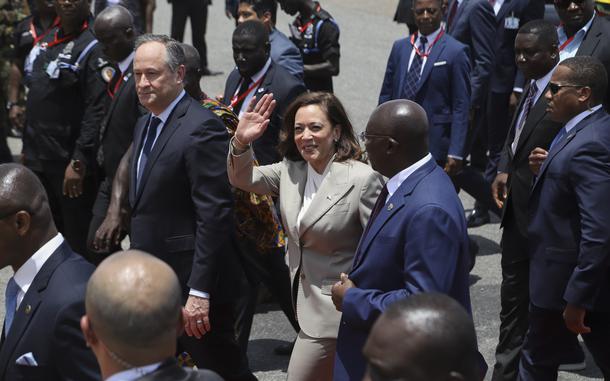 U.S. Vice President Kamala Harris waves as she arrives in Accra, Ghana, Sunday March 26, 2023. Harris is on a seven-day African visit that will also take her to Tanzania and Zambia. 