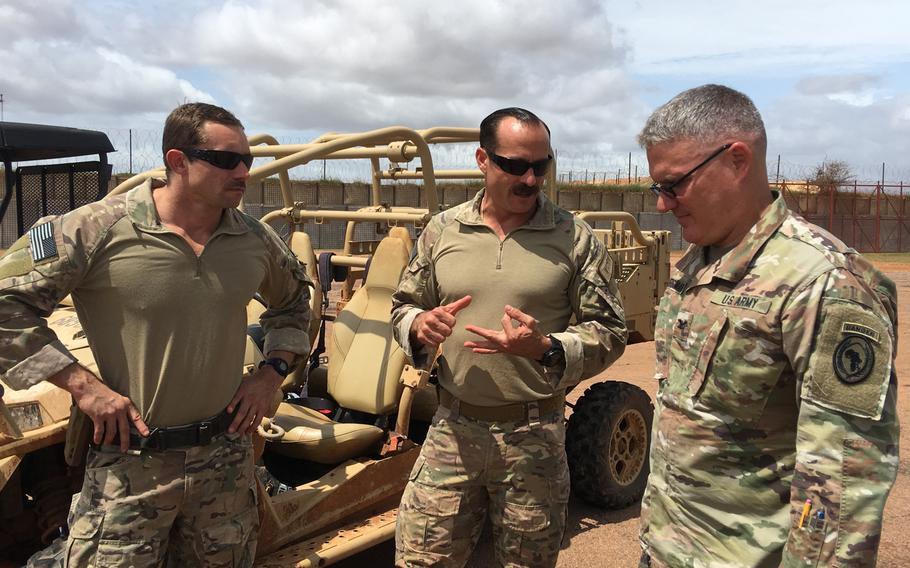 Col. Charles Bergman, lead integrator for U.S. Africa Command operations in Africa, receives a brief from U.S. personnel at a forward operating location in Somalia on Tuesday, June 11, 2019.