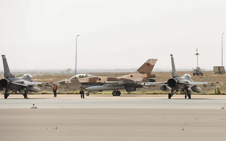A Royal Moroccan Air Force F-16 taxis past two F-16C Fighting Falcons during an exercise at Ben Guerir Air Base, Morocco, March 25, 2019. The U.S. military on Sept. 12, 2019 announced the sale of nearly $1 billion in missiles and other weaponry to Morocco, a key counterterrorism partner, had been cleared, including $209 million in bombs to arm Moroccan F-16 fighters.