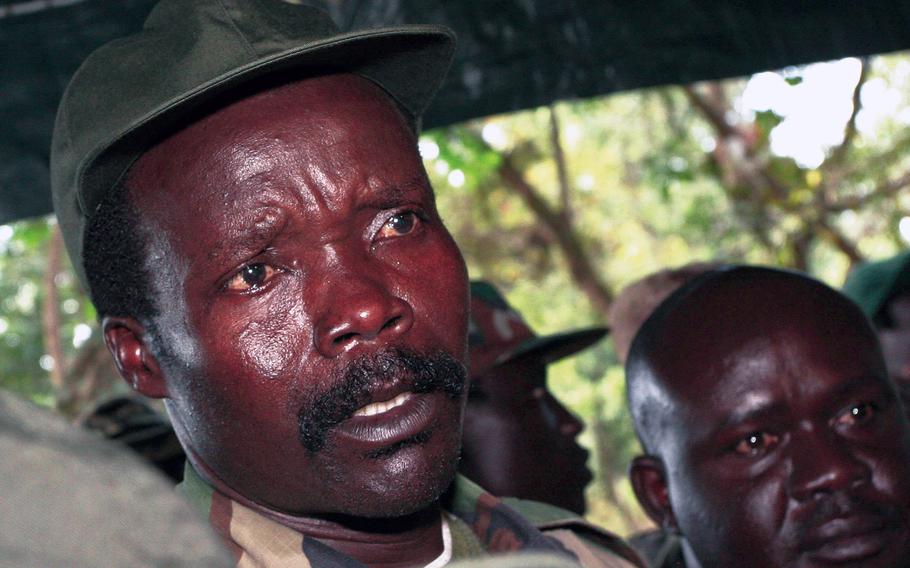 In this Nov. 12, 2006, photo, the leader of the Lord's Resistance Army, Joseph Kony, answers journalists' questions following a meeting with UN humanitarian chief Jan Egeland at Ri-Kwangba in southern Sudan. U.S. troops who were part of the hunt for Kony and his followers are now eligible for medals.