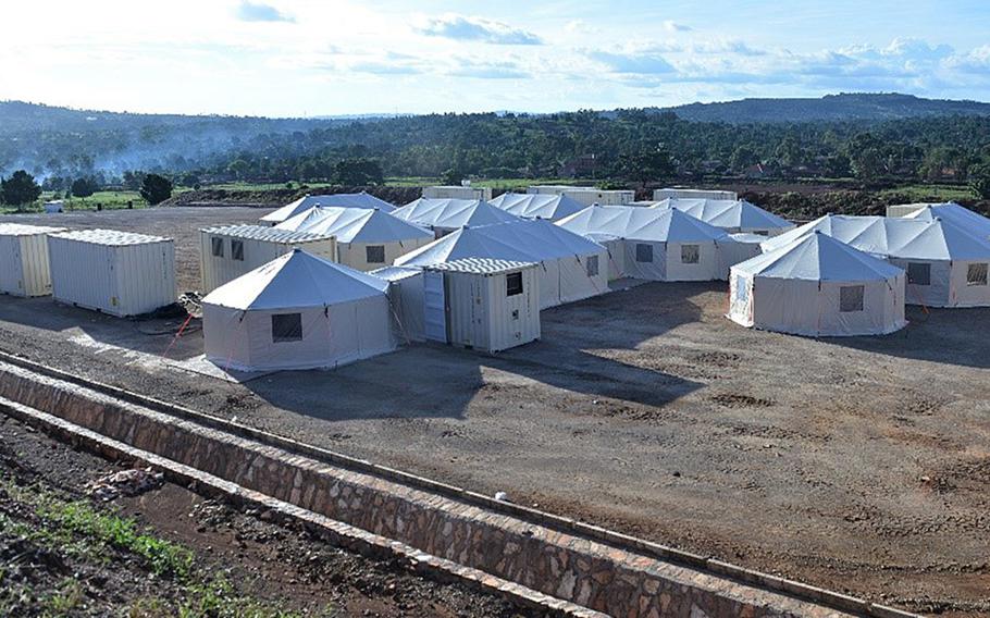 A mobile medical facility stands in the motor pool of the Uganda Rapid Deployment Capabilities Center in Jinja, Uganda, May 16, 2019. The U.S. has delivered mobile hospitals to Uganda and two other African nations. The units are now being used to treat coronavirus patients.