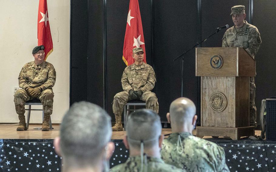 U.S. Army Gen. Stephen J. Townsend, right, commander of U.S. Africa Command, presides over the socially distanced change-of-command ceremony for Combined Joint Task Force-Horn of Africa, June 8, 2020, at Camp Lemonnier, Djibouti. Maj. Gen. Lapthe C. Flora, center, took command from Maj. Gen. Michael D. Turello.