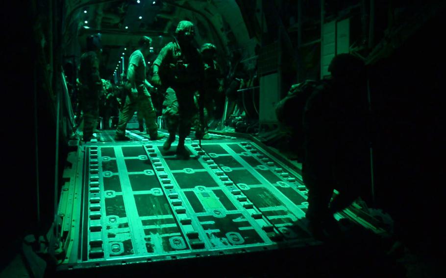 U.S. Army soldiers assigned to the East Africa Response Force, 101st Airborne Division, exit a C-130J Super Hercules assigned to the 75th Expeditionary Airlift Squadron at Manda Bay Airfield, Kenya, on January 5, 2020. The U.S. wants permission to strike terrorists in Kenya following a pre-dawn attack that day by al-Shabab militants, in which three Americans were killed.