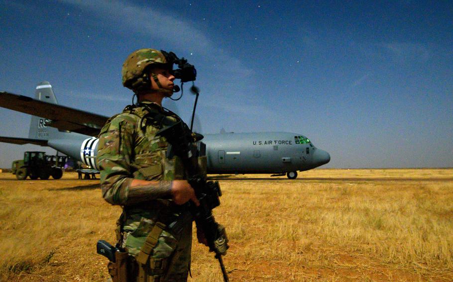 Spc. Christopher Andres of the Oregon National Guard, provides security for a 75th Expeditionary Airlift Squadron C-130J Super Hercules during unloading and loading operations in Somalia on Feb. 6, 2020. President Donald Trump has reportedly told advisers that he wants to withdraw U.S. troops from Somalia.
