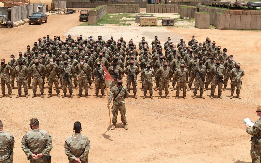 Soldiers with 1st Squadron, 113th Cavalry Regiment and Task Force Bayonet, deployed throughout the Horn of Africa, receive combat patches during a ceremony Aug. 24, 2020, in Somalia. President Donald Trump has reportedly told advisers that he wants to withdraw U.S. troops from the African country.