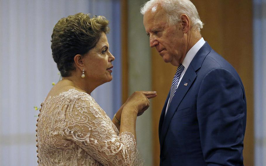 Brazil's President Dilma Rousseff, left, and  U.S. Vice President Joe Biden hold a bilateral meeting after she was sworn in for a second term, at the Itamaraty palace in Brasilia, Brazil, Jan. 1, 2015.