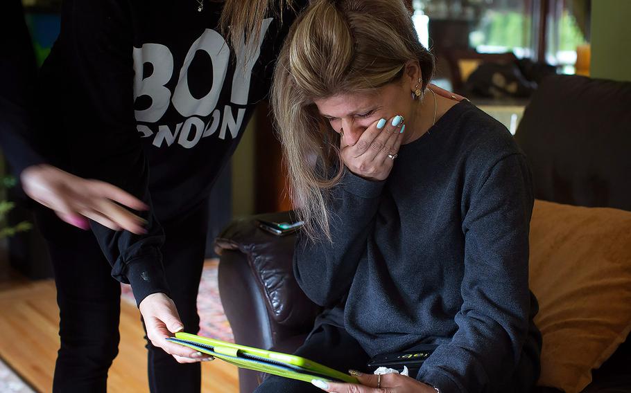 Tima Kurdi is overcome with emotion as she looks at photos of her late nephews Alan and Galib Kurdi, at her home in Coquitlam, British Columbia, Canada, on Sept. 3, 2015. The body of 3-year-old Syrian, Alan, was found on a Turkish beach after the small rubber boat he, his 5-year old brother Galib and their mother, Rehan, were in capsized during a voyage from Turkey to Greece. 