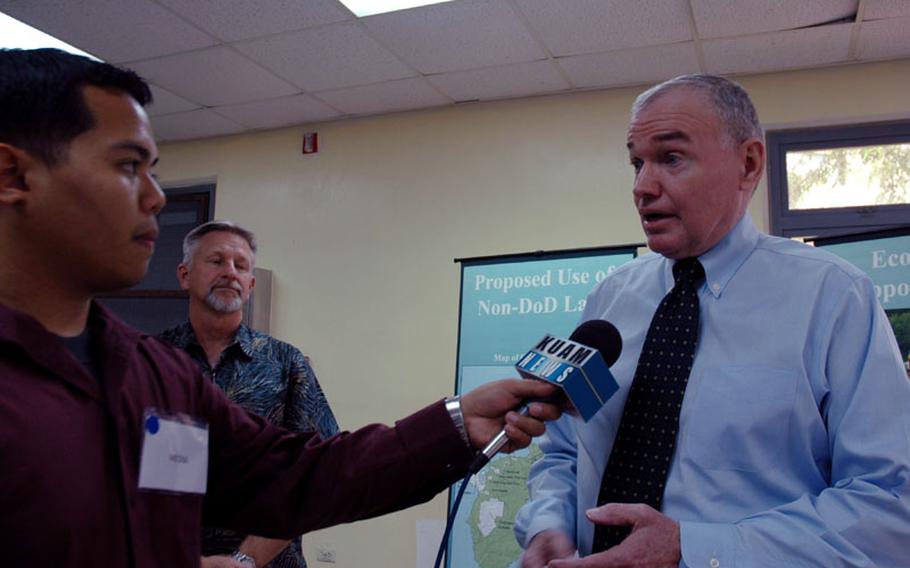 David Bice, a former Marine major general charged with overseeing the military's buildup on Guam, talks to a reporter in January 2010 during a Guam public hearing on the expansion plans. Bice announced Wednesday that he will resign from the position at the end of the year.