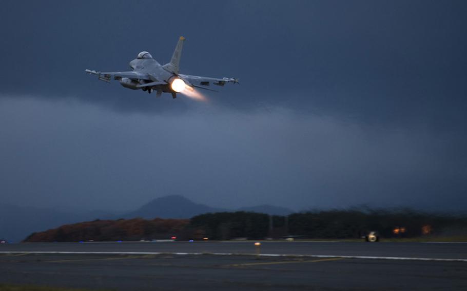 An F-16 Fighting Falcon takes off Wednesday from Misawa Air Base, Japan, on the final day of an operational readiness exercise. Pilots use the F-16's afterburner, delivering about 27,000 pounds of thrust, to rotate skyward as quickly as possible. 