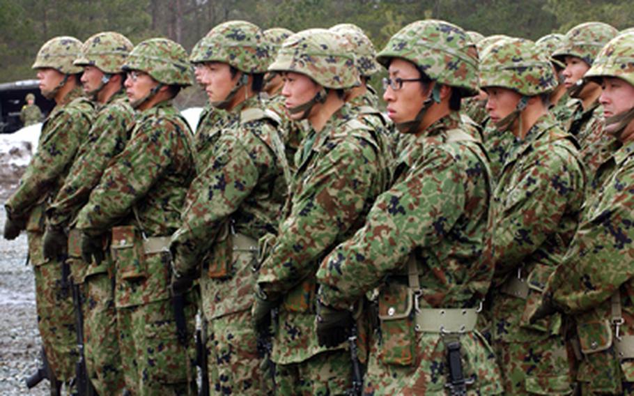 Members of Japan's Self-Defense Force stand in formation.