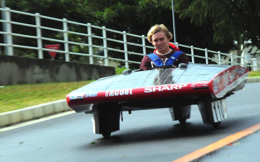 Jacob Jadwin, an 11th-grader from Kubasaki High School, zips around a short, closed circuit course at Kubasaki High School on Feb. 11, 2011. 