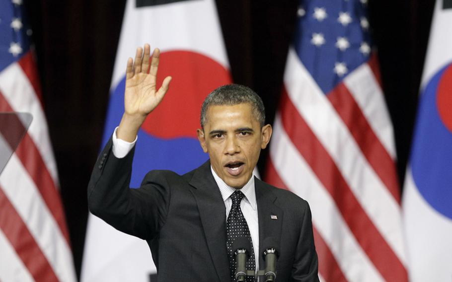 U.S. President Barack Obama delivers a speech at Hankuk University in Seoul on March 26, 2012.