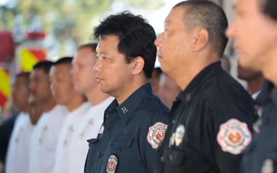 A group of Japanese firefighters and American servicemembers gathered Sept. 11, 2012, to honor the men and women who died trying to save others when the World Trade Center’s twin towers collapsed 11 years ago.