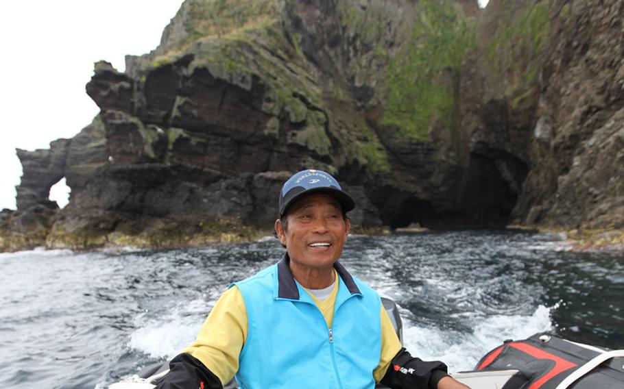Fisherman Kim Seong-do, 72, takes his boat around the desolate Dokdo island where he first moved in 1962 looking for solitude and a good catch. 