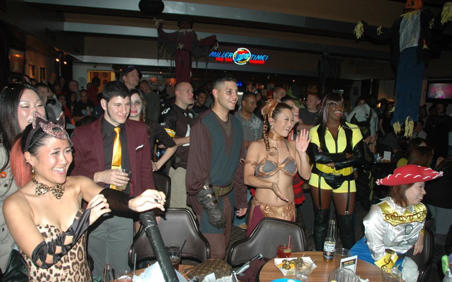 The Yokota Enlisted Club was packed with servicemembers and local nationals celebrating Halloween during the weekend Oct. 26 and 27, 2012. 