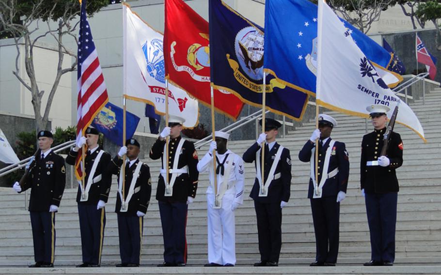 An honor guard takes its position at the National Memorial Cemetery of the Pacific in Hawaii on Veterans Day, Nov. 11, 2012. 