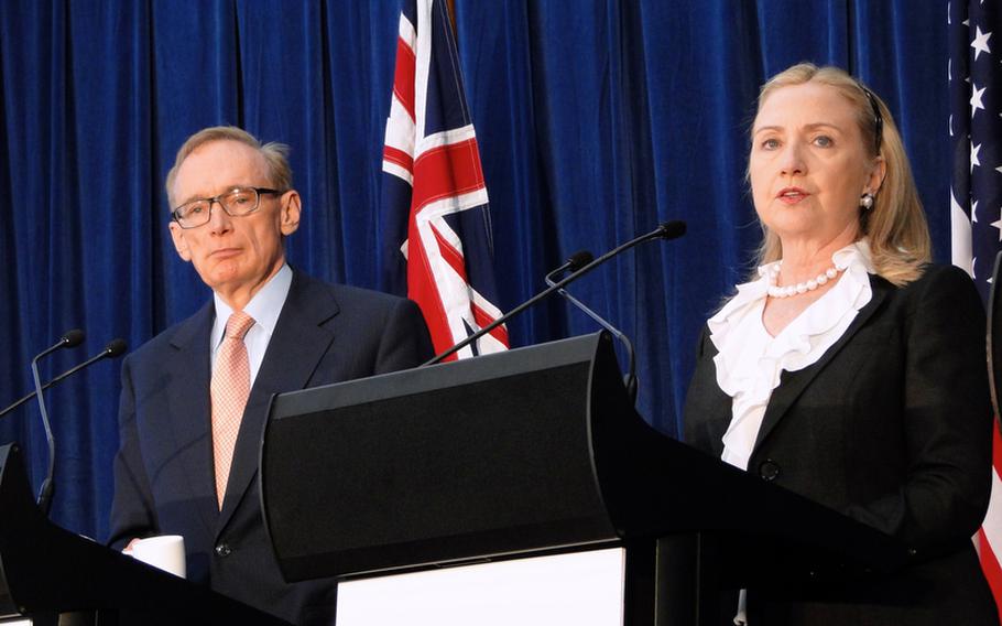 Australian Foreign Minister Bob Carr and U.S. Secretary of State Hillary Clinton at a joint news conference in Perth, Australia.  Clinton and Secretary of Defense Leon Panetta were in Australia to discuss the Australia-U.S. relationship.