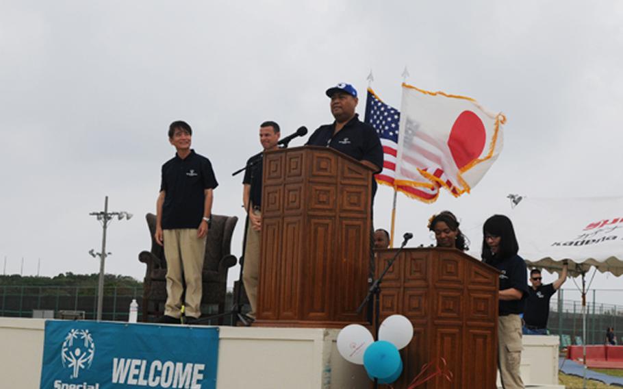 The former sumo wrestler, Konishiki, announces the opening of the 13th Kadena Special Olympics at Kadena Air Base Saturday. 
The Hawaii-born retired sumo wrestler visits Kadena Air Base to cheer the event for special-needs athletes from both Okinawa and U.S. military communities on the island. 
About 900 athletes compete in the games while about 3,000 American and Japanese volunteers gather to cheer the athletes and support the annual event.