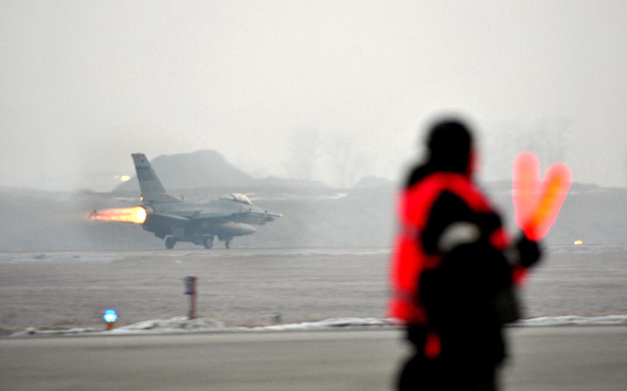 An F-16 launches during operational readiness exercise Beverly Midnight from Osan Air Base, Republic of Korea, Jan. 15, 2013. 