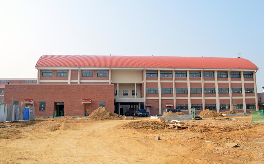 Construction delays with a pair of schools on Camp Humphreys in South Korea have compelled DODDS education officials to lean on staff and volunteers to get facilities functional in time for the start of school on Aug. 26, 2013. This is an April 2013 photo of one of the schools.
