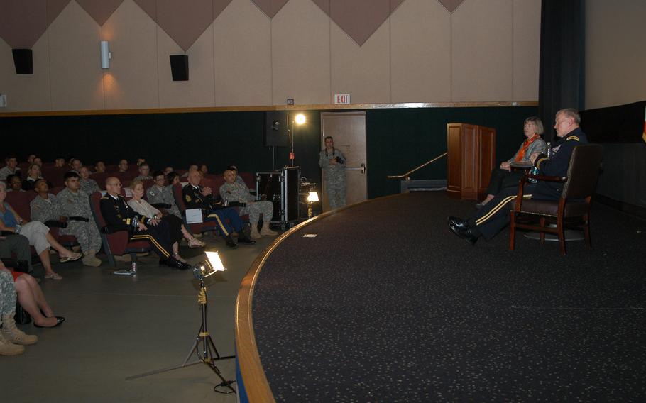 Gen. Martin Dempsey, chairman of the Joint Chiefs of Staff, and his wife Deanie, spoke at a town hall-style meeting with about 300 servicemembers and their spouses at Yongsan Garrison in South Korea Tuesday, Oct. 1, 2013. Dempsey answered an array of questions during the hour-long meeting.
