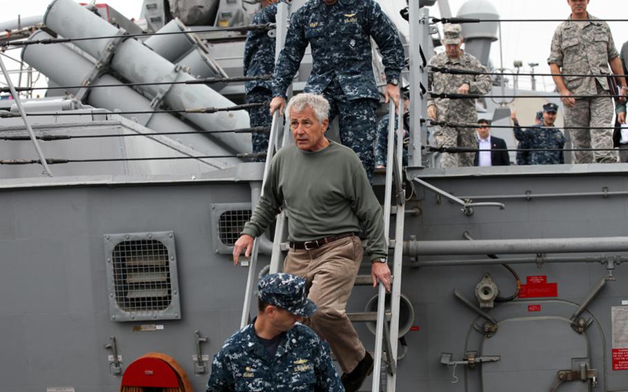 Defense Secretary Chuck Hagel visits the USS Stethem in Yokosuka, Japan, on Oct. 4, 2013. He spoke to sailors about the government shutdown.