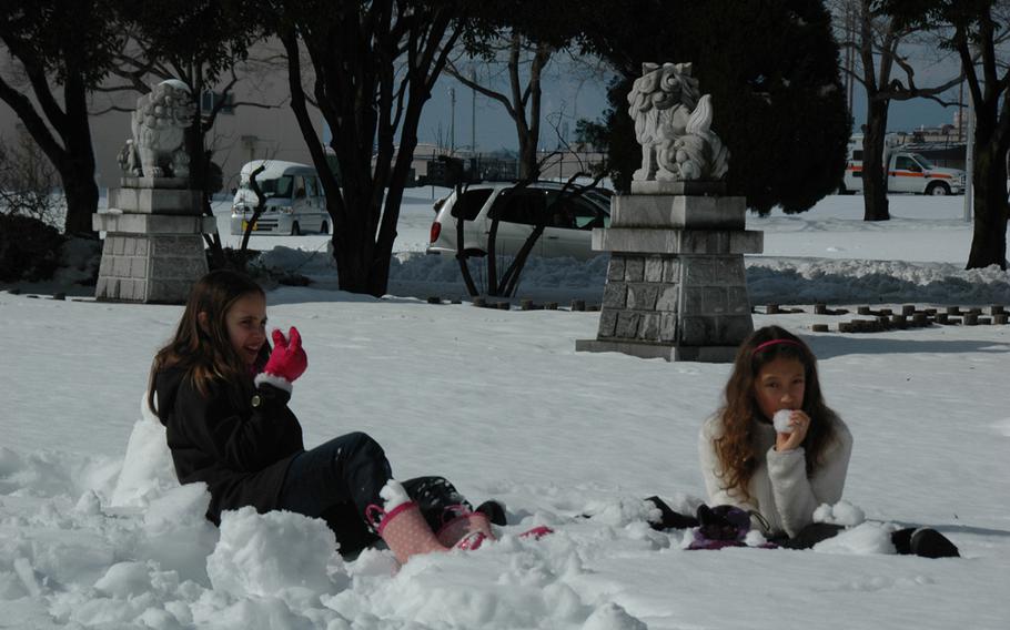 Youngsters were out enjoying the snow on Yokota Air Base Sunday morning, Feb. 9, 2014. 