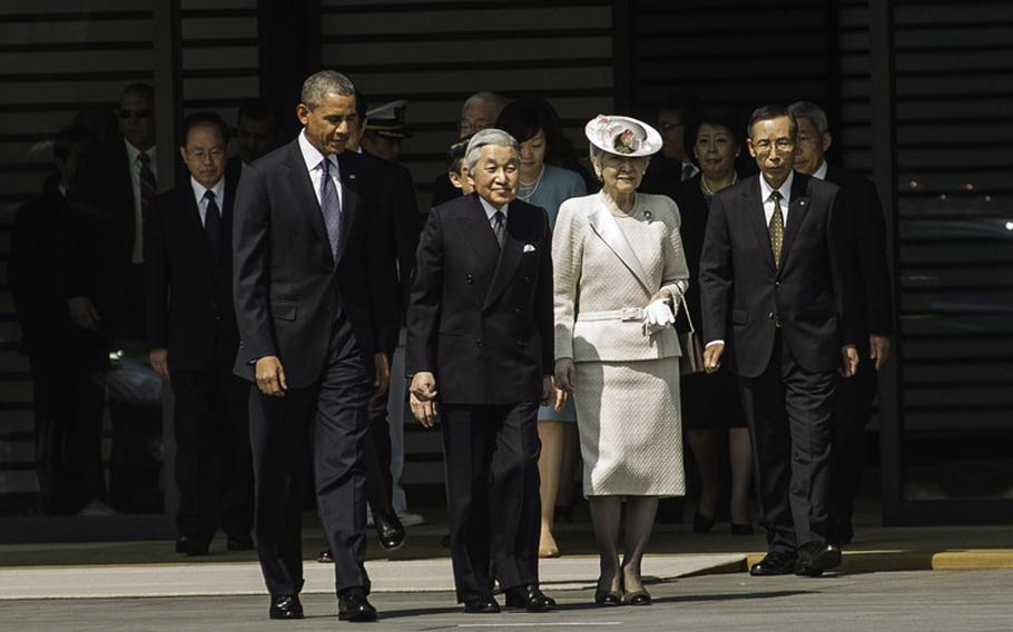 President Barack Obama meets with Japan's Emperor Akihito and Empress Michiko during a welcome ceremony as he arrived at Imperial Palace in Tokyo, Thursday, April 24, 2014. 