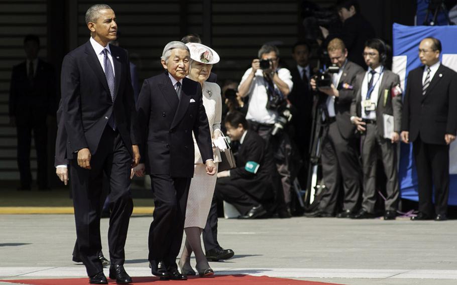 President Barack Obama meets with Japan's Emperor Akihito and Empress Michiko during a welcome ceremony as he arrived at Imperial Palace in Tokyo, Thursday, April 24, 2014. 