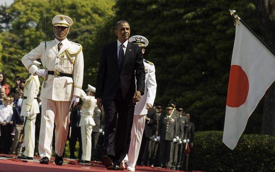 President Barack Obama reviews troops from the Japan Self-Defense Force and met with Emperor Akihito at the Imperial Palace in Tokyo, Japan, April 24, 2014.