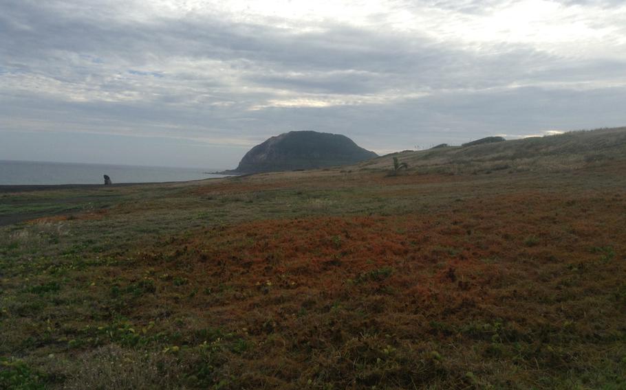 A view of Mount Suribachi from nearby the invasion beach on Iwo To, historically known as Iwo Jima.
