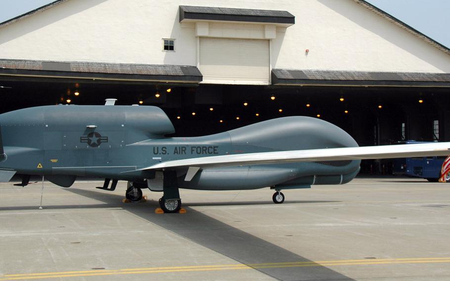 A Global Hawk sits on the runway at Misawa Air Base, Japan, on Friday, May 30, 2014. The U.S. military deployed the large unmanned aircraft to the northern Japanese base this week.