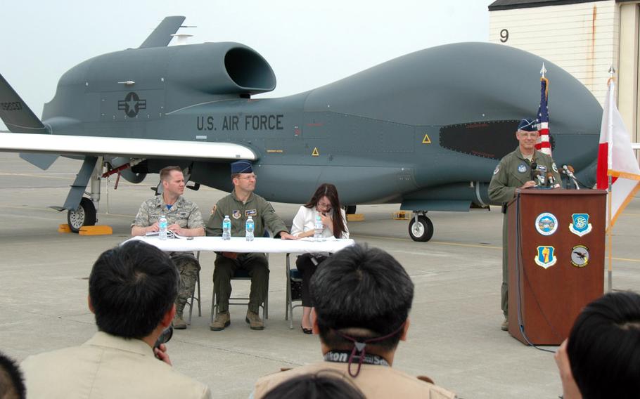 U.S. Forces Japan commander Lt. Gen. Sam Angelella speaks to Japanese reporters about the arrival of Global Hawk unmanned aircraft at Misawa Air Base, Japan, on Friday. 