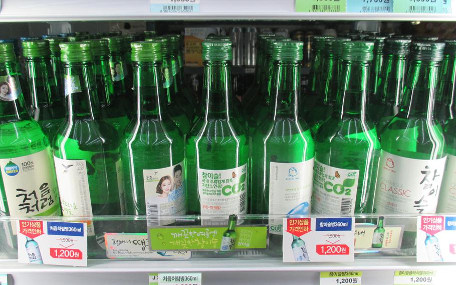The 7th Air Force commander announced a weekend-long ban on drinking for all airmen stationed in South Korea because of an increasing number of alcohol-related incidents involving airmen in recent months. Pictured are bottles of soju, a popular South Korean alcoholic drink, on sale at a convenience store in Seoul.