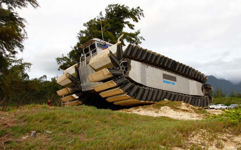 The Marine Corps Warfighting Lab is overseeing the development of the Ultra Heavy-lift Amphibious Connector, an amphibious craft designed to get over rugged terrain and paddle atop water.