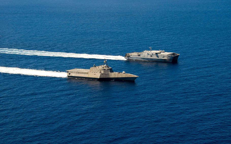 The littoral combat ship USS Coronado and joint high speed vessel USNS Millinocket transits in formation off the coast of Southern California as part of a photo exercise for RIMPAC, July 11, 2014. 