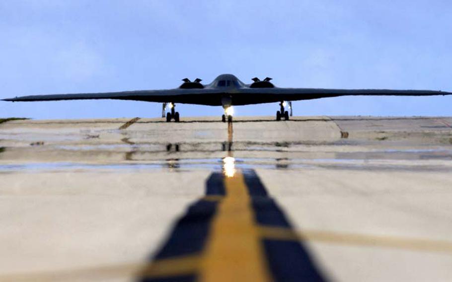 In this file photo from April 25, 2005, a B-2 stealth bomber from 393rd Expeditionary Bomb Squadron, Whiteman Air Force Base, Mo., taxis down the flightline at Andersen Air Force Base, Guam.