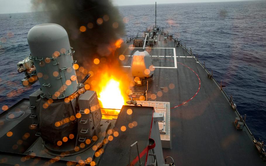 Arleigh Burke-class guided-missile destroyer USS Fitzgerald launches a vertical launch anti-submarine rocket from its forward launchers during Valiant Shield.