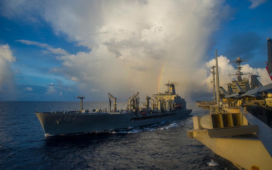 Military Sealift Command fleet replenishment oiler USNS John Ericsson steams alongside the U.S. Navy's forward-deployed aircraft carrier USS George Washington during a replenishment-at-sea. During the RAS, ships from Commander, Task Force 70 and 73 participated in a simulated submarine threat exercise for Valiant Shield 2014.  Valiant Shield is a U.S.-only exercise integrating an estimated 18,000 Navy, Air Force, Army and Marine Corps personnel, more than 200 aircraft and 19 surface ships, offering real-world joint operational experience to develop capabilities that provide a full range of options to defend U.S. interests and those of its allies and partners.