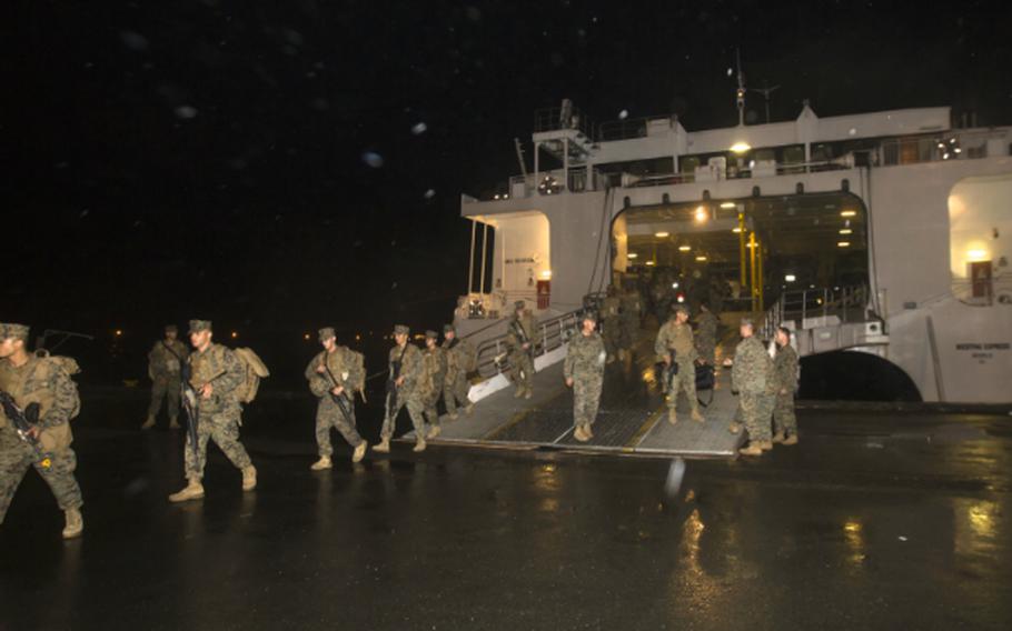 U.S. Marines and sailors arrive in a high speed vessel swift at the Navy Support Depot, Subic Bay, Philippines, Sept. 19, 2014, to begin preparations for the bilateral Amphibious Landing Exercise (PHIBLEX 15).